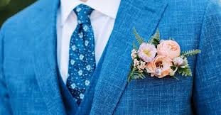 Pocket Square - A fresh floral pocket square for prom is a stylish alternative to the traditional boutonniere, designed with fresh blooms and greenery to coordinate with the tux, suit, and prom colors. Each piece is custom created for a polished, modern look that adds texture, personality, and a unique floral touch for a standout formal style.