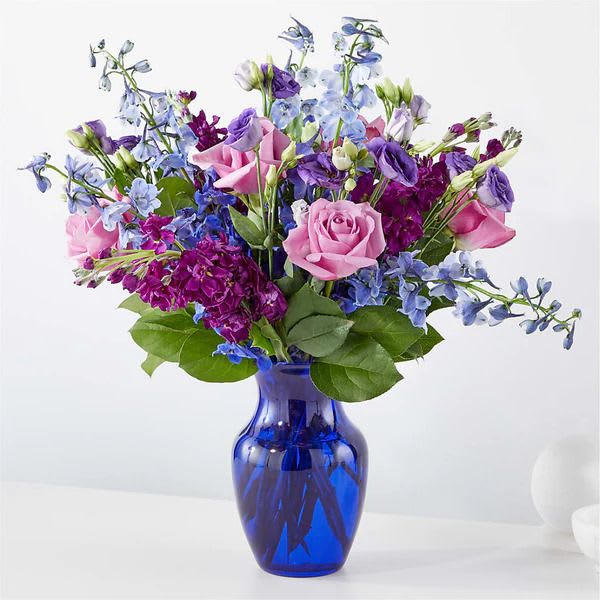 Twilight Glow Bouquet - Capturing the dreamy feel of dusk, this artful mix of blue and purple stems will voice a congratulations, happy birthday, or thinking of you magically.