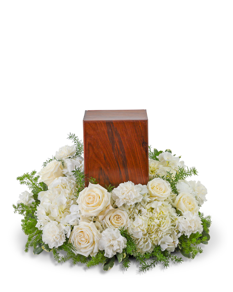 Angels Among Us Urn Surround - Our Angels Among Us Urn Surround is a poignant and elegant design, carefully crafted with roses, carnations, hydrangeas, and premium foliage. This beautiful arrangement is designed to encircle an urn or a cherished photo, serving as a meaningful tribute that embodies love, gratitude, and cherished memories. Let this exquisite floral display honor and celebrate the enduring love and precious moments shared with your loved one.