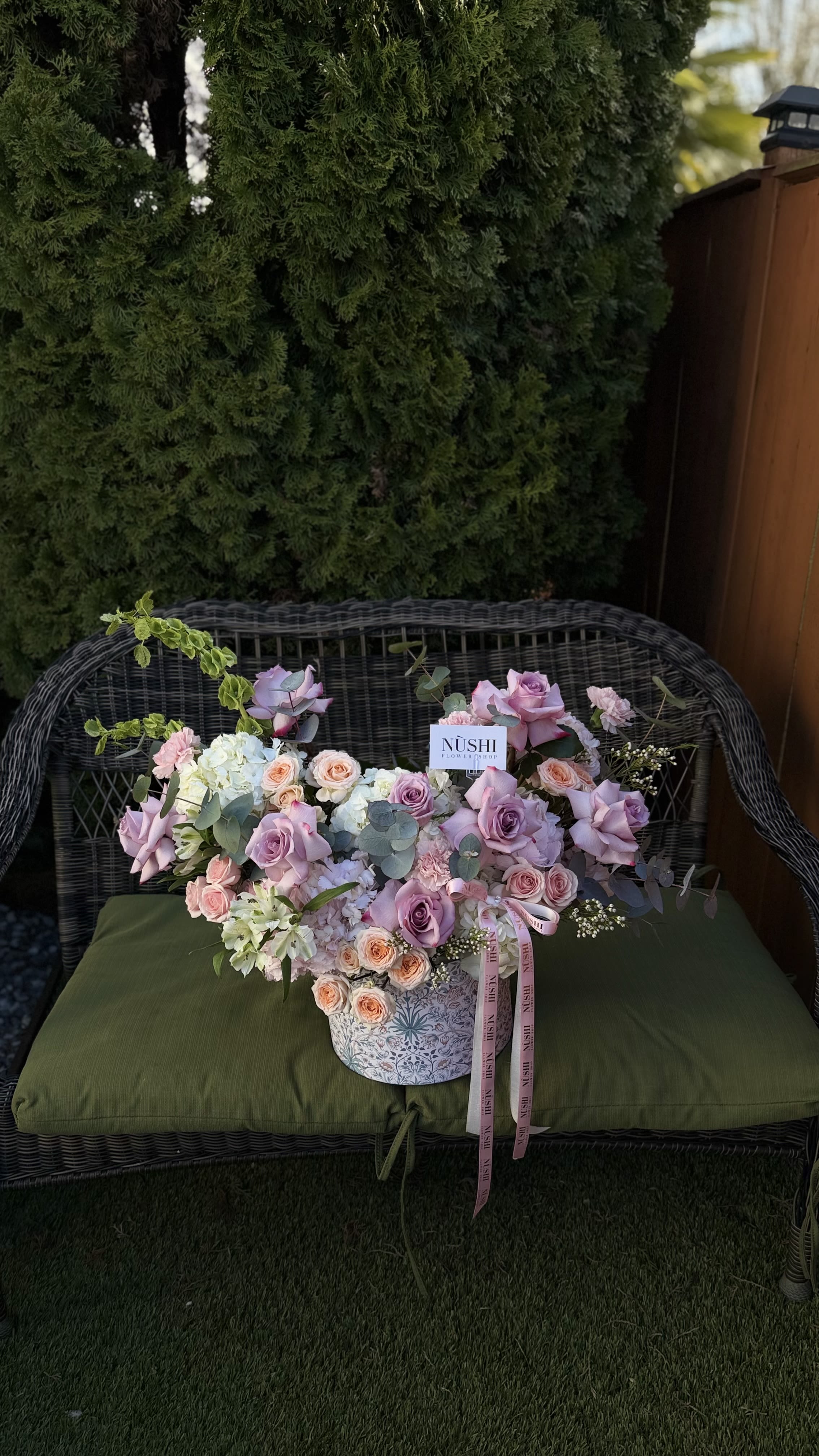 Secret Garden Arrangement - The Secret Garden Arrangement is a romantic floral design arranged in an elegant box, inspired by the beauty of a hidden garden in full bloom. This arrangement features a delicate mix of fresh seasonal flowers in soft, natural colors, carefully arranged to create a lush, garden-style look.