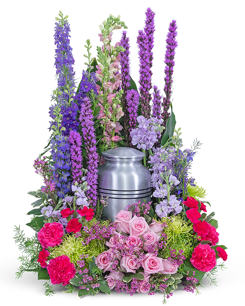 Garden of Life Urn Surround - The Garden of Life Surround is a beautiful final tribute for a lost loved one. Roses, Carnations, Miniature Carnations, Liatris, Larkspur, Stock, Snapdragons, Spider Mums and premium foliage elegantly surround the urn of your loved one like a gorgeous garden. This surround will make a beautiful centerpiece of sympathy flowers for a woman or man that will be forever cherished.