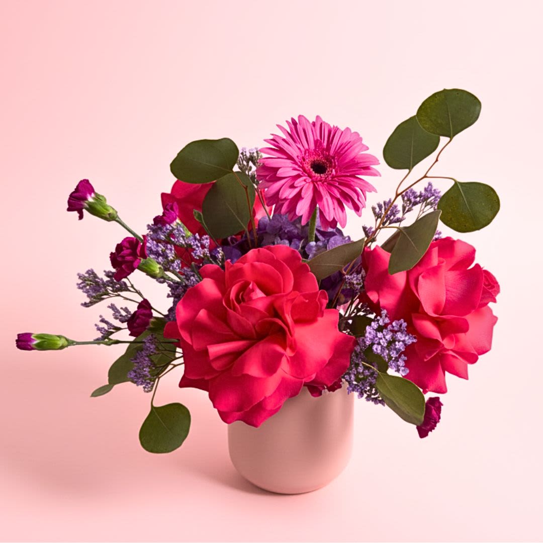 Absolutely Fabulous  - "Sweetie, darling, Mummy's here. Sweetie, darling, Mummy is... Sweetie, darling, let me in!"-Edina Monsoon  Send your Absolutely Fabulous mom a gorgeous arrangement of vibrant hot pink and purple flowers! Flowers are arranged in a pink ceramic vase.   Mother's Day Delivery- Due to the volume of arrangements, delivery times can not be guaranteed over the Mothers Day holiday.  We'd prefer not to leave arrangements outside so please let Mom know something is coming. 