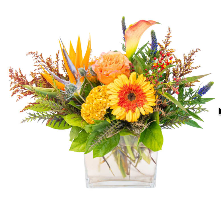 Lovely Day - Floral arrangement that brings is sure to make any day lovely. Featuring a curated blend of fresh, seasonal blooms arranged in a modern vase, this piece is perfect for events, celebrations, or everyday décor.