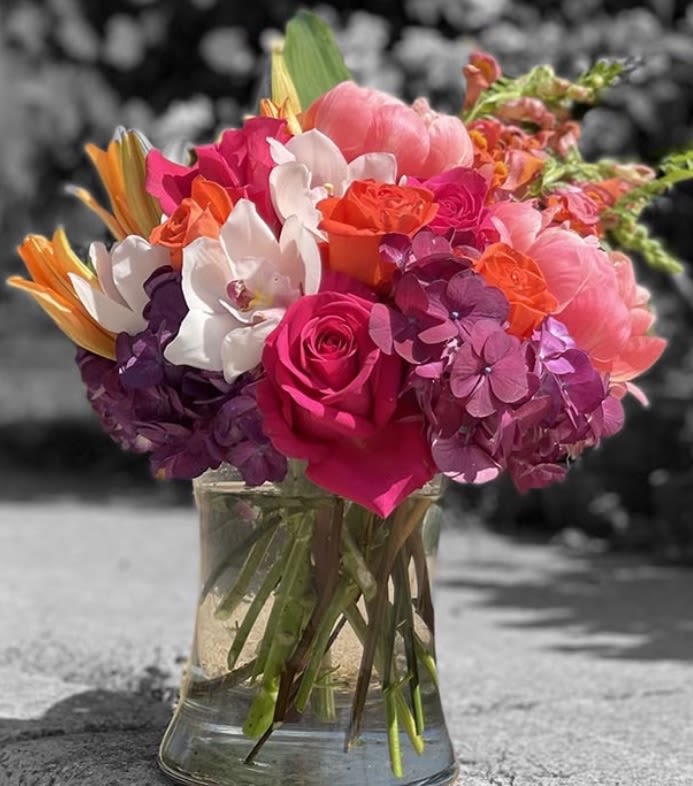 Lake Ave - Who doesn’t love a peaceful walk down the magical Lake Ave? This arrangement is full of vibrant Hydrangea Peonies, Orchids and other blooms reminiscent of the Lake Ave beauty.