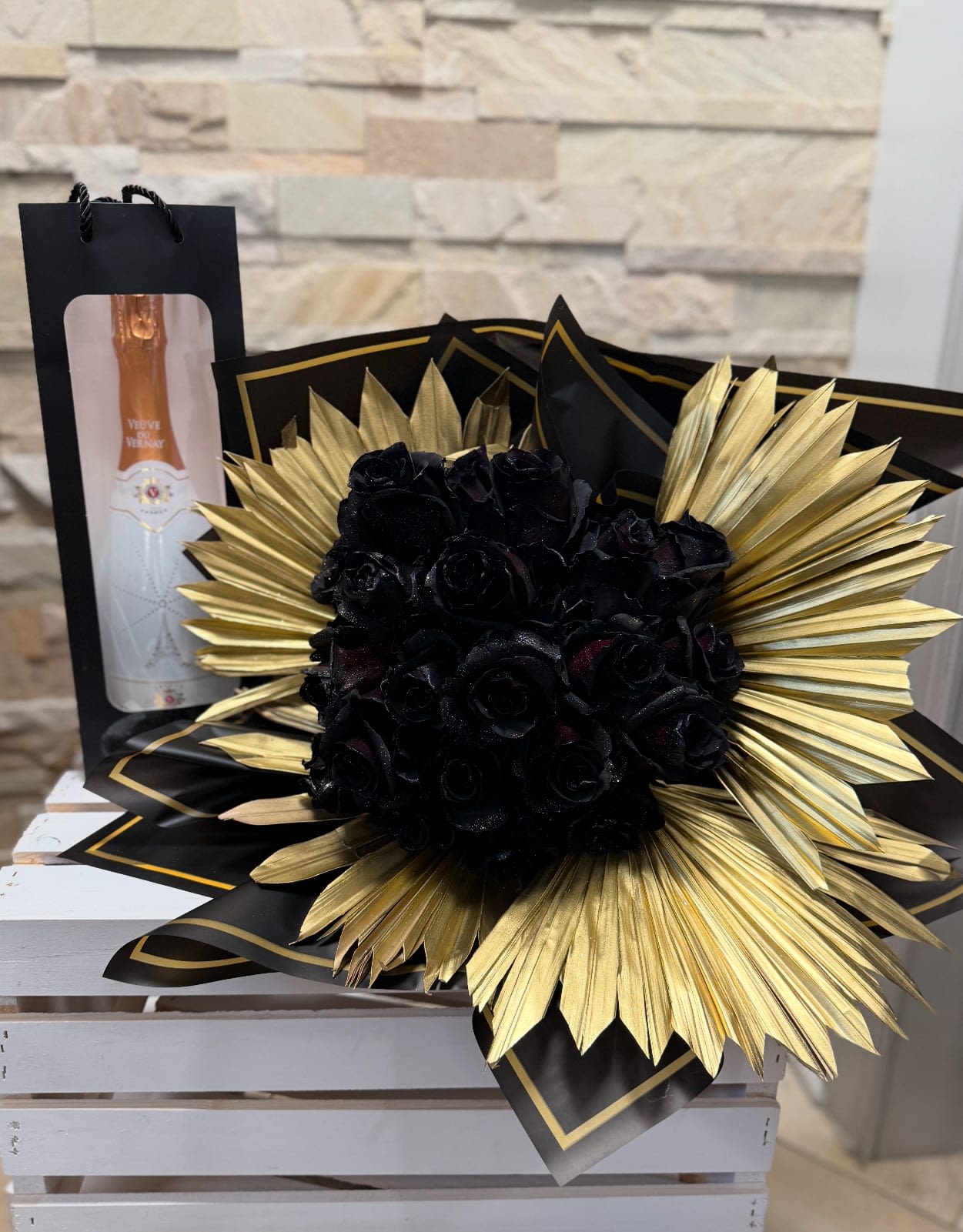 New Year New Me - 1 Dozen and Half of Premium Black Roses accompanied by a bottle of champagne. Roses available in other colors, specify in notes or give us a call.