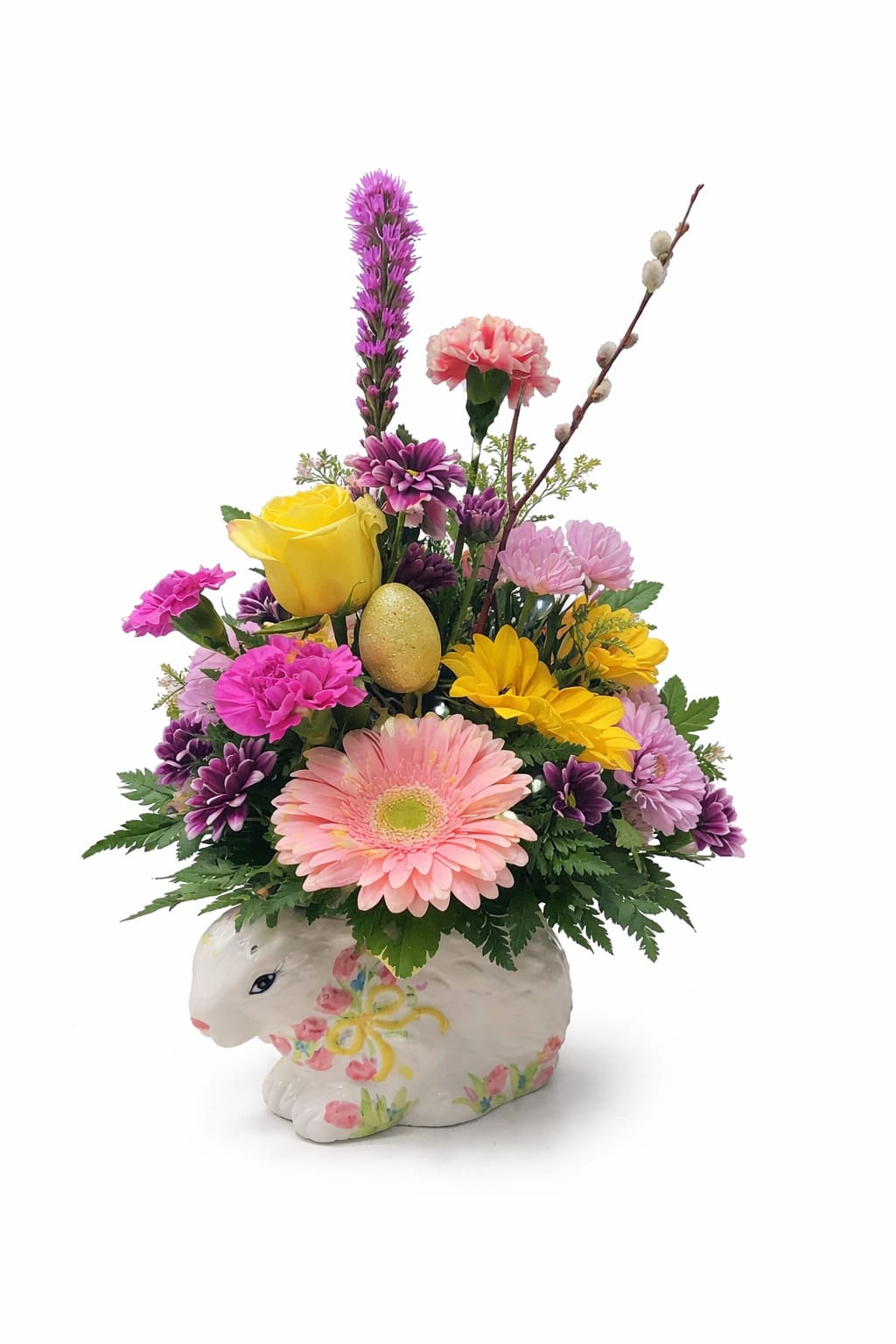 Hoppy Easter - Mixed spring flowers with Easter decorations, in a ceramic Easter container
