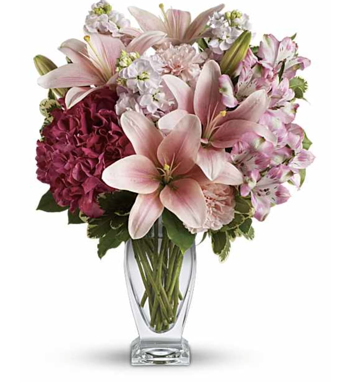 Mothers Love - This Beautiful mix of fragrant lilies and lush hydrangea in dreamy shades of pink. Presented in a glass vase, this beautiful bouquet is affection perfection! Includes pink hydrangea, asiatic lilies, alstroemeria, carnations and stock, accented with fresh greens. 