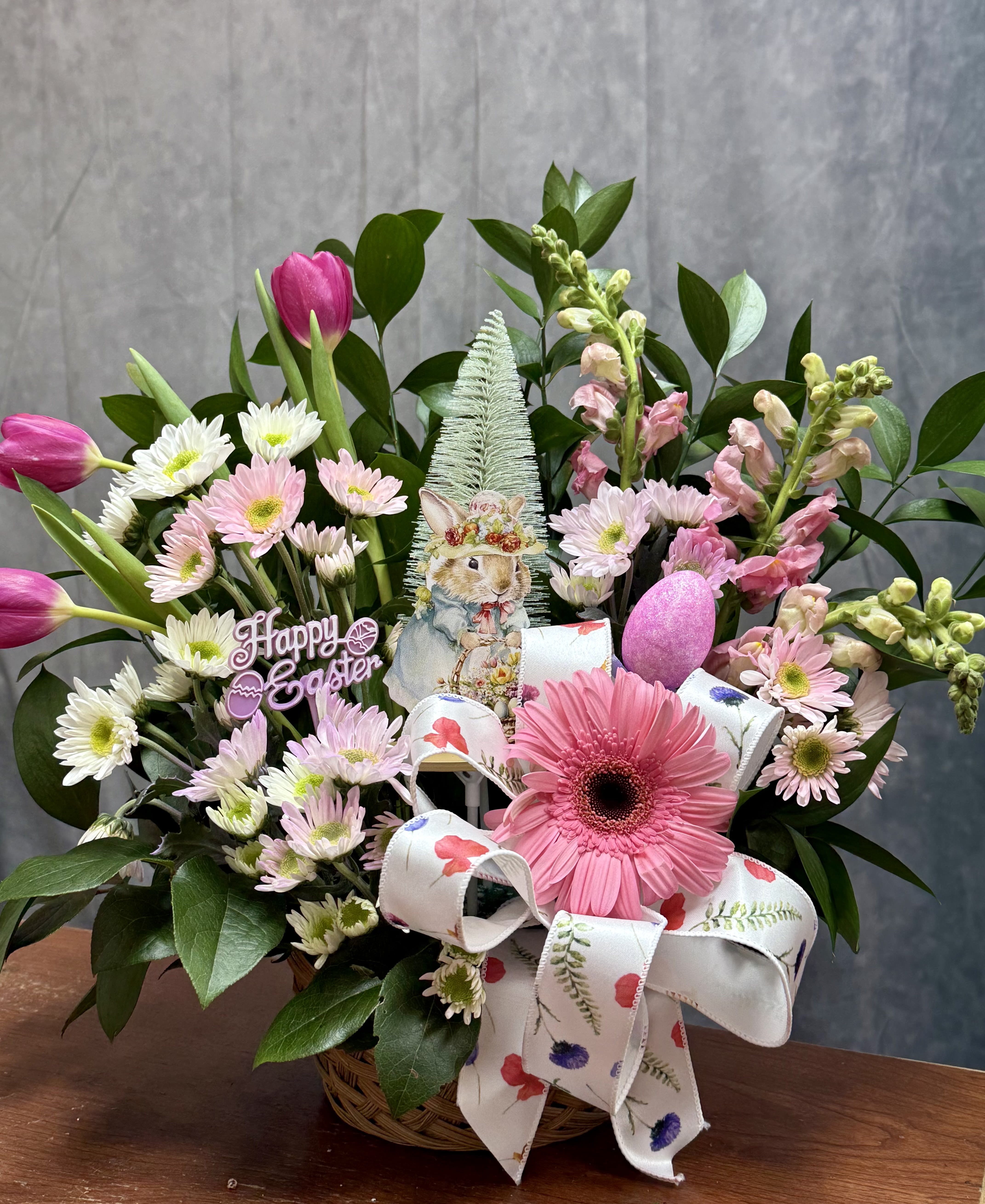 Easter Basket  - Introducing Our New Design Easter Basket , where elegance meets nature's artistry. Embrace the beauty of our latest creation, meticulously crafted to bring a touch of floral enchantment into your world. Discover a celebration of Easter in every petal with the easter decor The size shown is the standard size  Decor piece vary depends on availability 