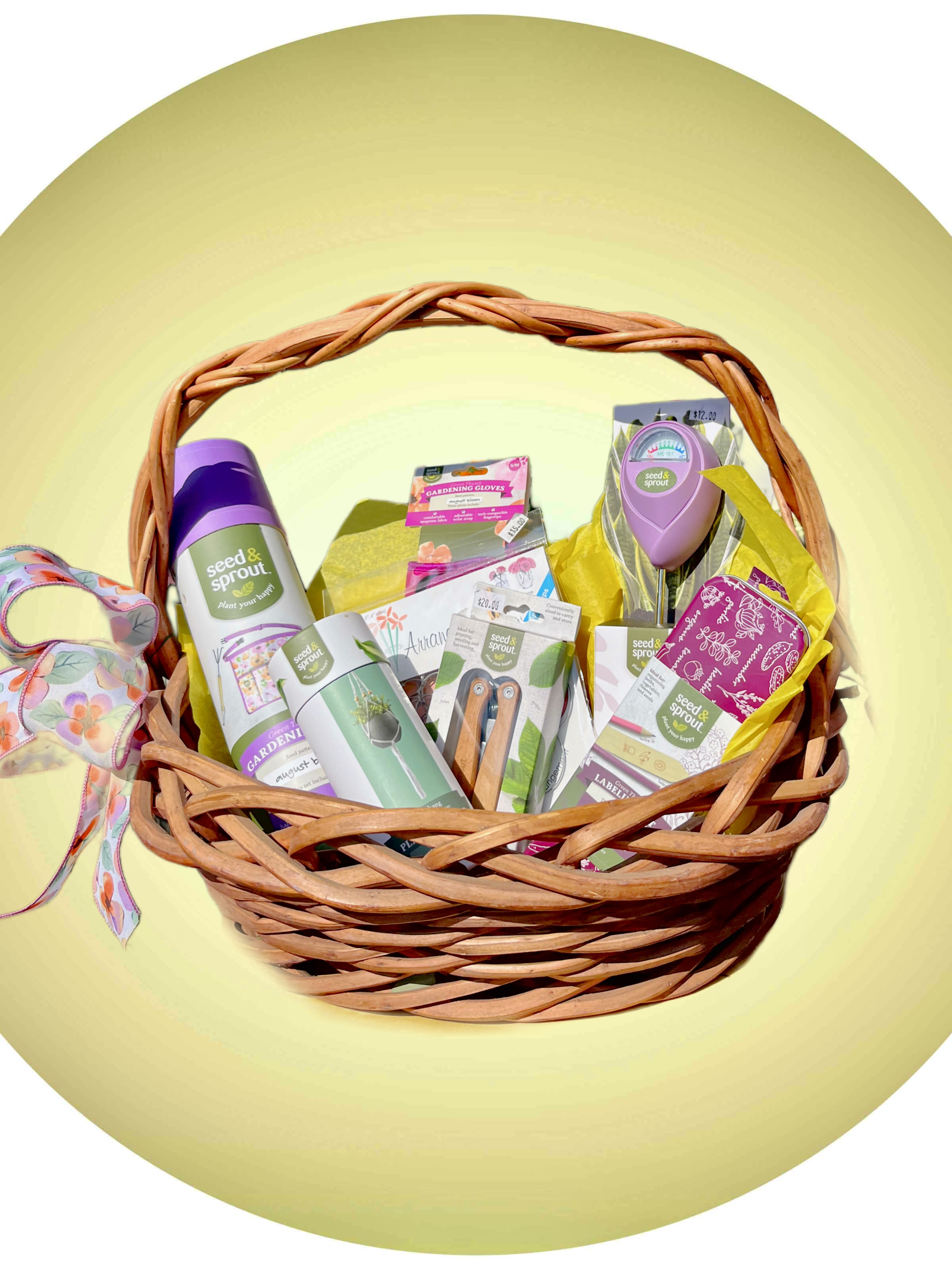 Gardener's Basket  - The perfect gardener's basket for both beginner and advanced. Includes seed &amp; sprout products: garden pocket tool (pruning sheers, straight blade, sickle blade, forked blade, serrated blade, container opener), gardening apron (with hand rake and hand shovel), macrame plant hanger, labeling set, easy cage arrangers, gardening gloves, and moisture meter. Placed in a decorative basket with bows and option to add a card. 
