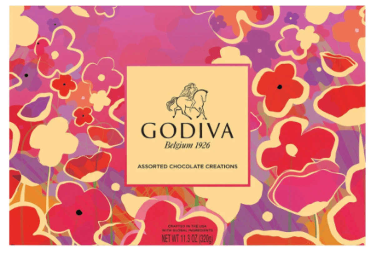 Rectangular Godiva chocolate box with colorful abstract flowers in pink, red, and yellow