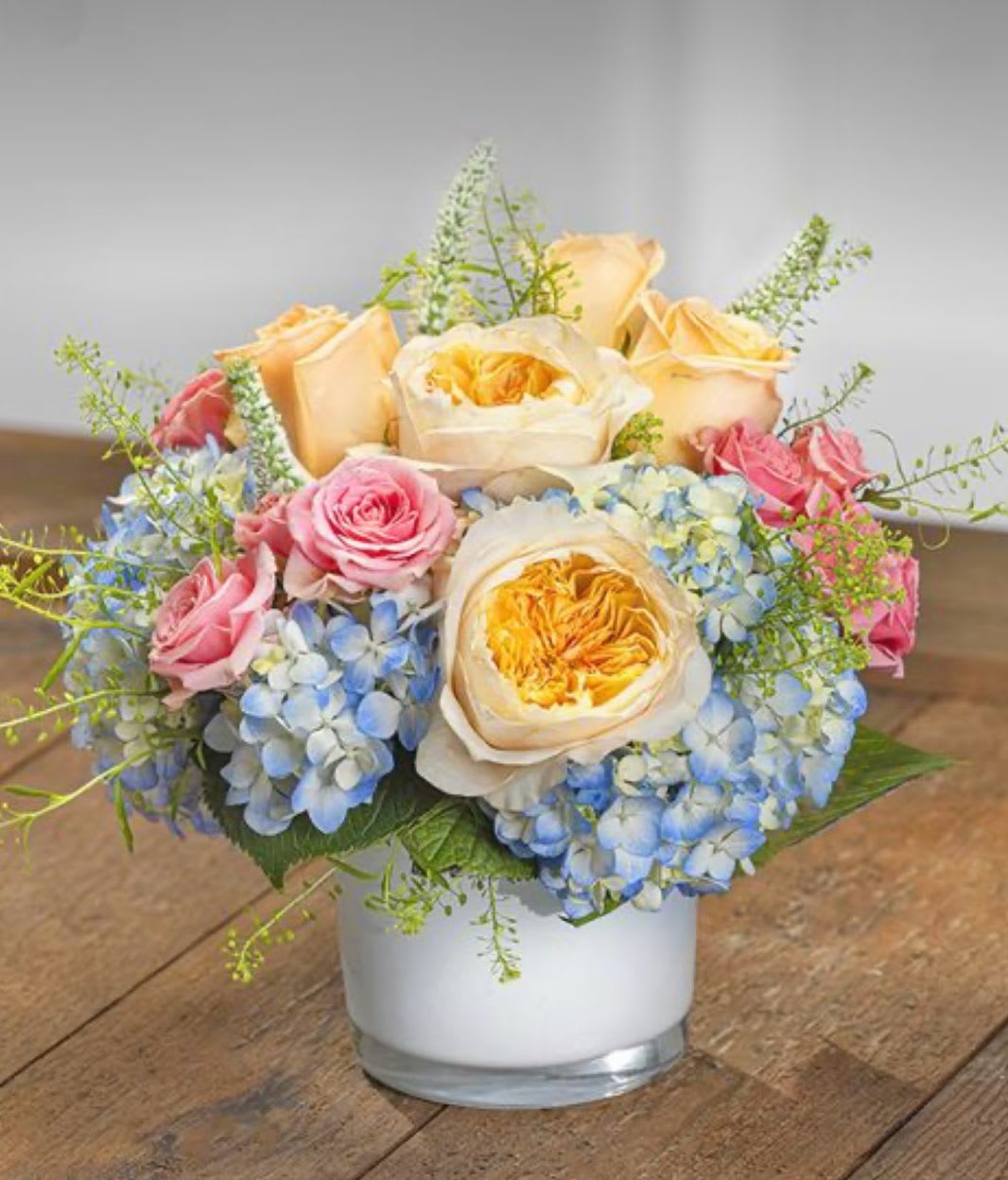 Pastel Gardens Arrangement - Beautiful arrangement with unique candlelight garden roses.