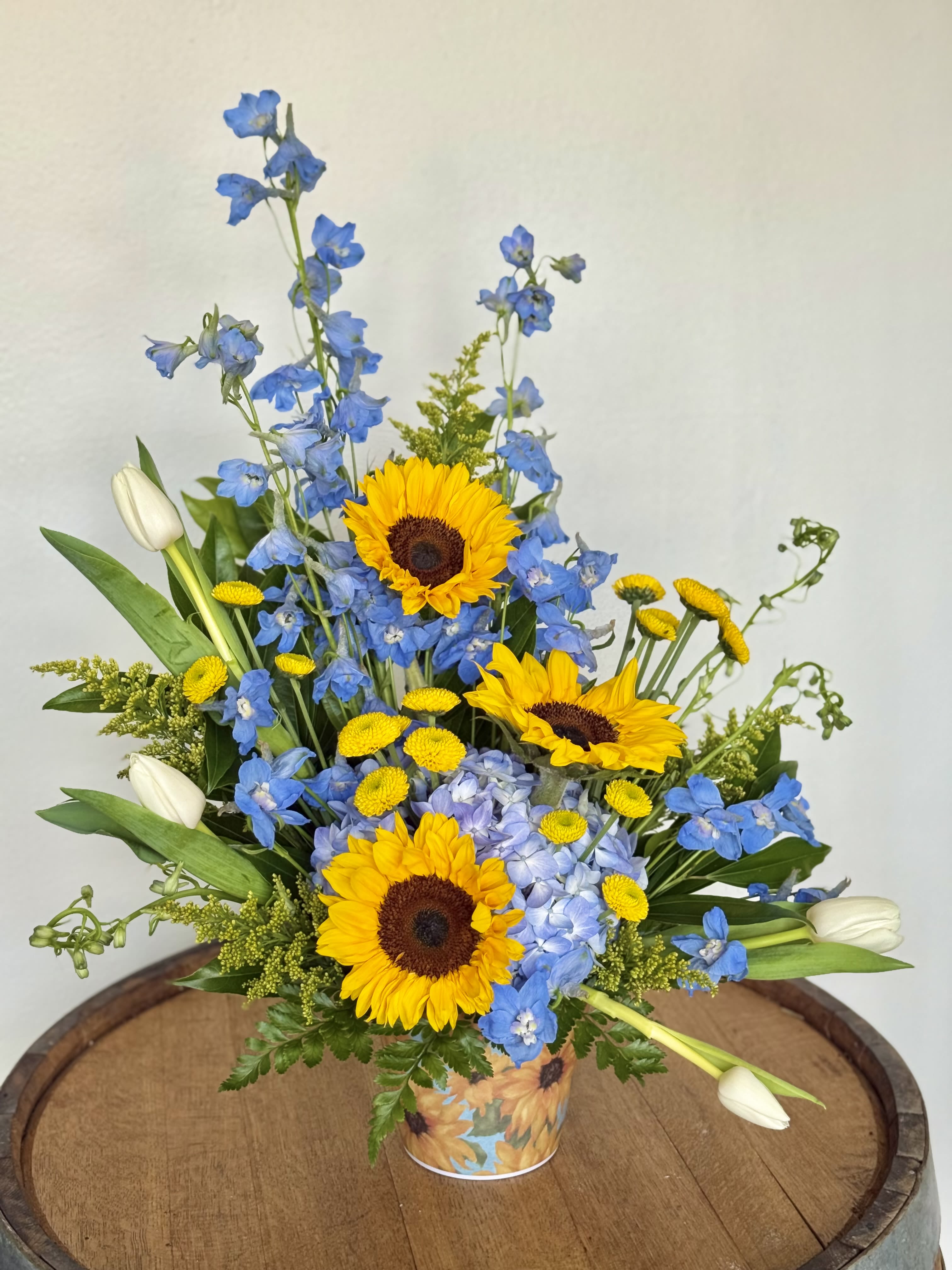 Sunshine and Blue Jeans - "Hot summers, cool breezes... and front porch laughter."  Everything light blue and Sunflowers!