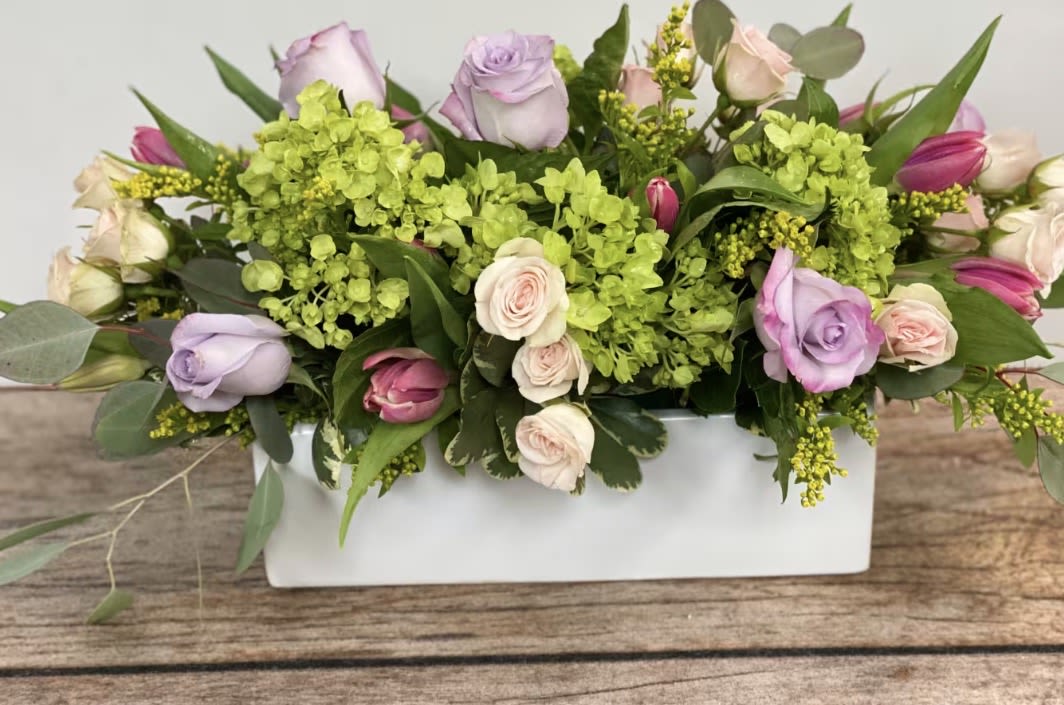 Spring Splendor - An oblong, low centerpiece perfect for a table centerpiece. Approx. 14" long.