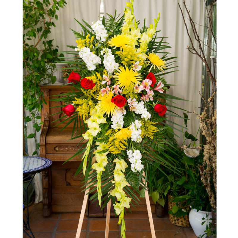 SYMPATHY -Designer's Choice Easel Spray in Masculine Colors - Easel spray of seasonal flowers in bolder, more masculine colors delivered to Mount Sinai Memorial Parks, Forest Lawn, Pierce Brothers, or to any church in the area.  