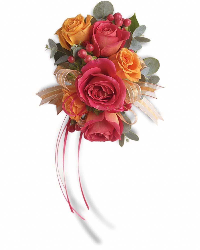 Corsage of pink and orange roses with red berries and striped ribbon streamers.