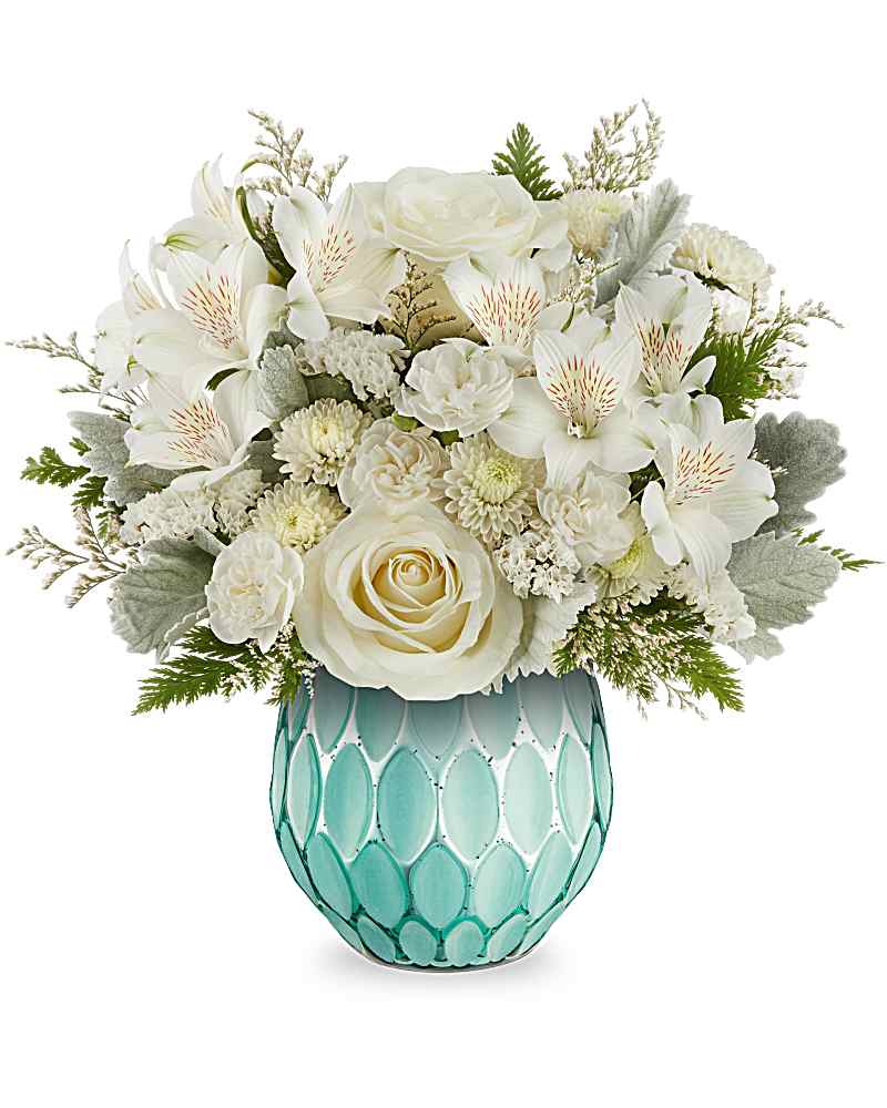 White roses, alstroemeria, and mums arranged in a teal textured ceramic vase