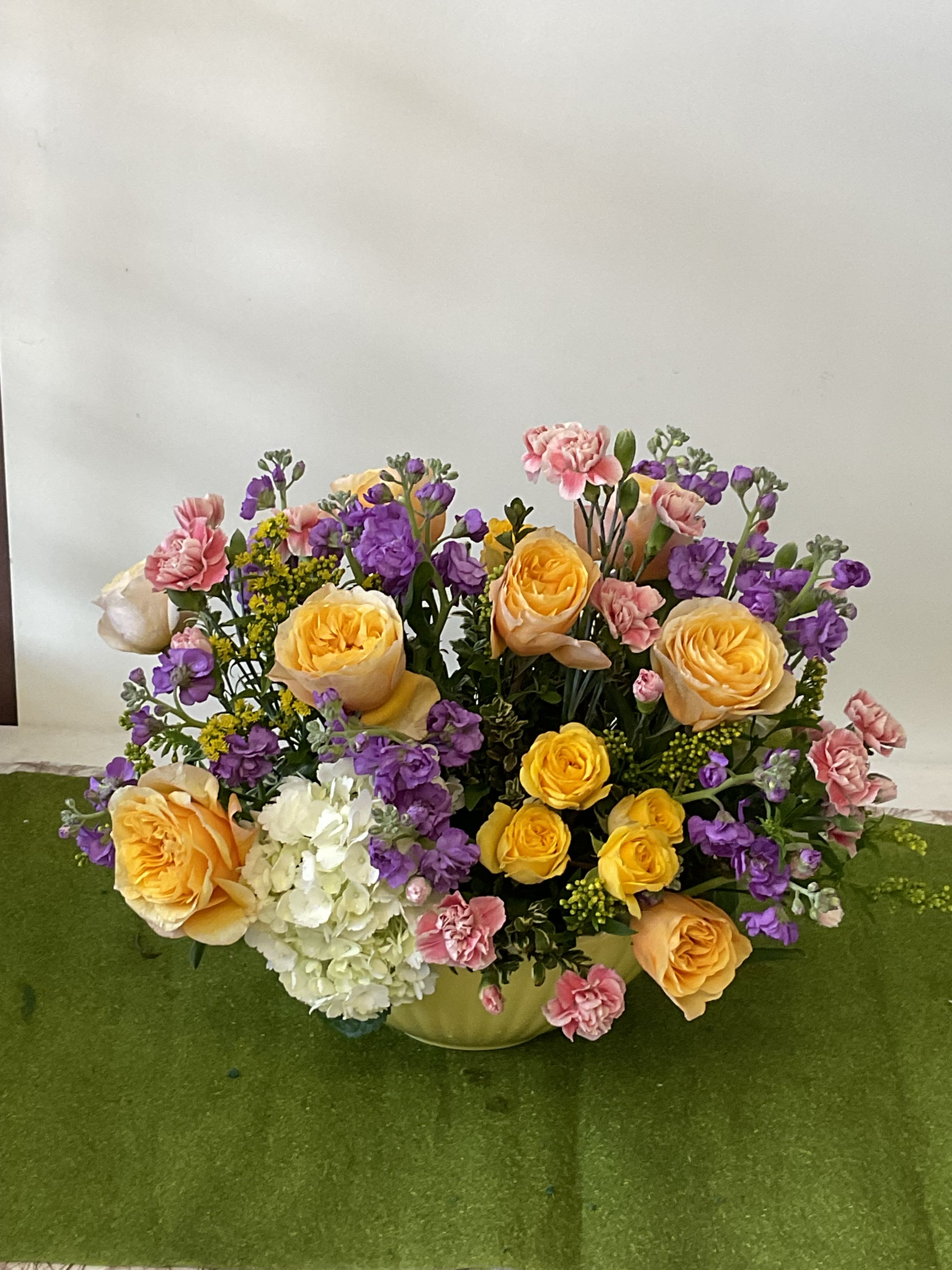 26-107 - Mixed-color mixed bouquets bursting with seasonal blooms-fresh, cheerful arrangements perfect for Mother's Day, birthdays, get well, anniversaries, Easter or just because any time of year.