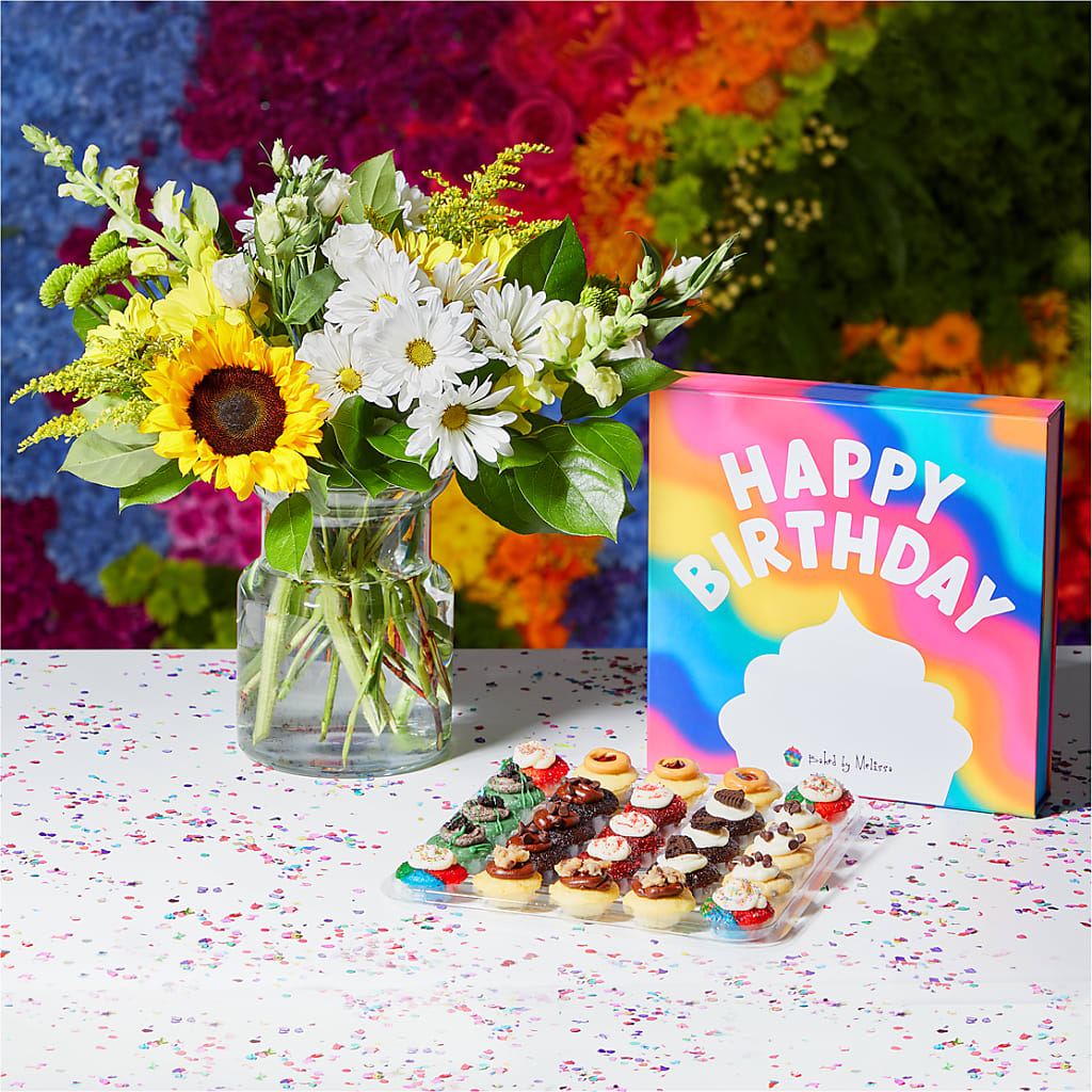 Birthday gift set with sunflower and daisy bouquet, dessert tray, and colorful Happy Birthday box