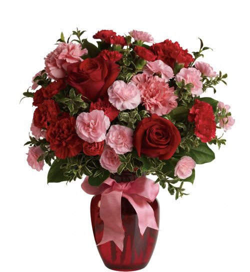  Dance With Me Bouquet - There's a special someone at the top of your dance card – who brings laughter and joy to your heart every day! Show them how much you care with a sweet mix of carnations and roses in pretty shades of red and pink.