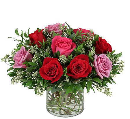 Love you more! - Show them that you love them more with this romantic array of colorful roses! Simply stunning!
