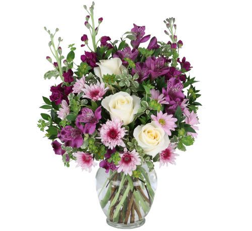 Majestic Amethyst Bouquet -  A Stunning Display of Elegance &amp; Charm – This breathtaking arrangement features rich purple alstroemeria, soft pink daisies, and luxurious ivory roses, creating an enchanting mix of beauty and sophistication.   Symbol of Love &amp; Admiration – The deep purple hues symbolize respect and admiration, while the white roses represent purity and grace, making this bouquet perfect for celebrations, sympathy gestures, or heartfelt gifts.   Handcrafted for a Luxurious Touch – Expertly arranged in a clear glass vase, this bouquet is designed to impress at first sight and last for days.   The Perfect Gift for Any Occasion – Whether for birthdays, anniversaries, congratulations, or just because, the Majestic Amethyst Bouquet makes every moment more special.