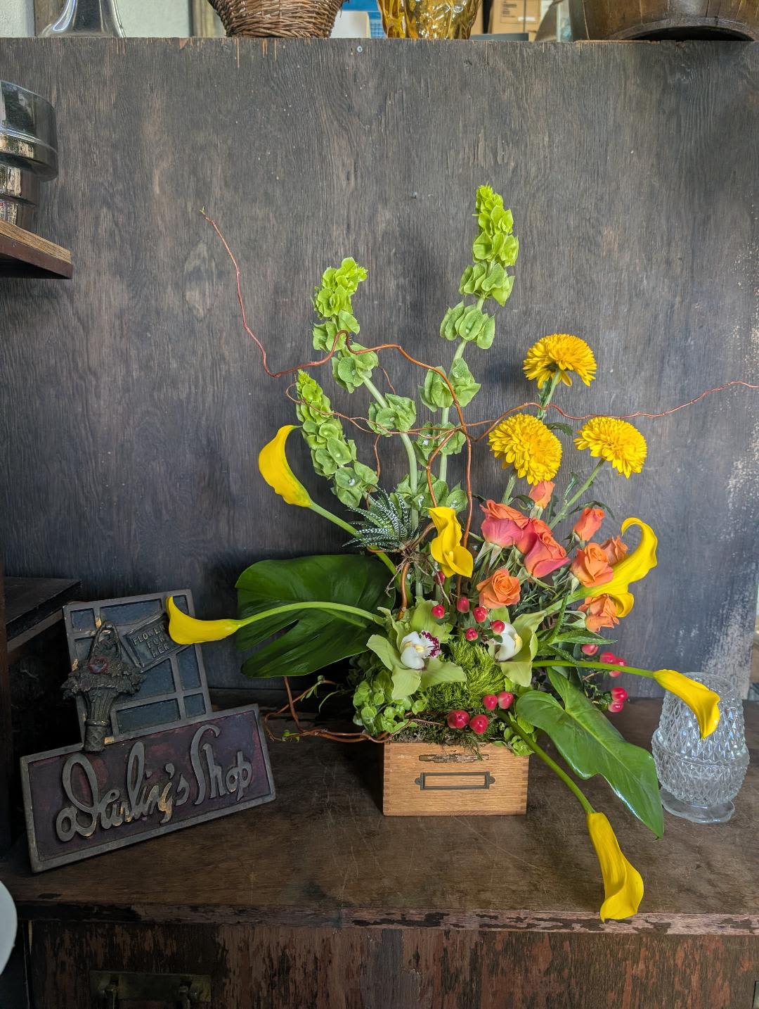 Vintage School Box with lid - next day delivery - Callas, spray roses bell of Ireland and more. Boxes are vintage and not all have the metal label holder in front.  