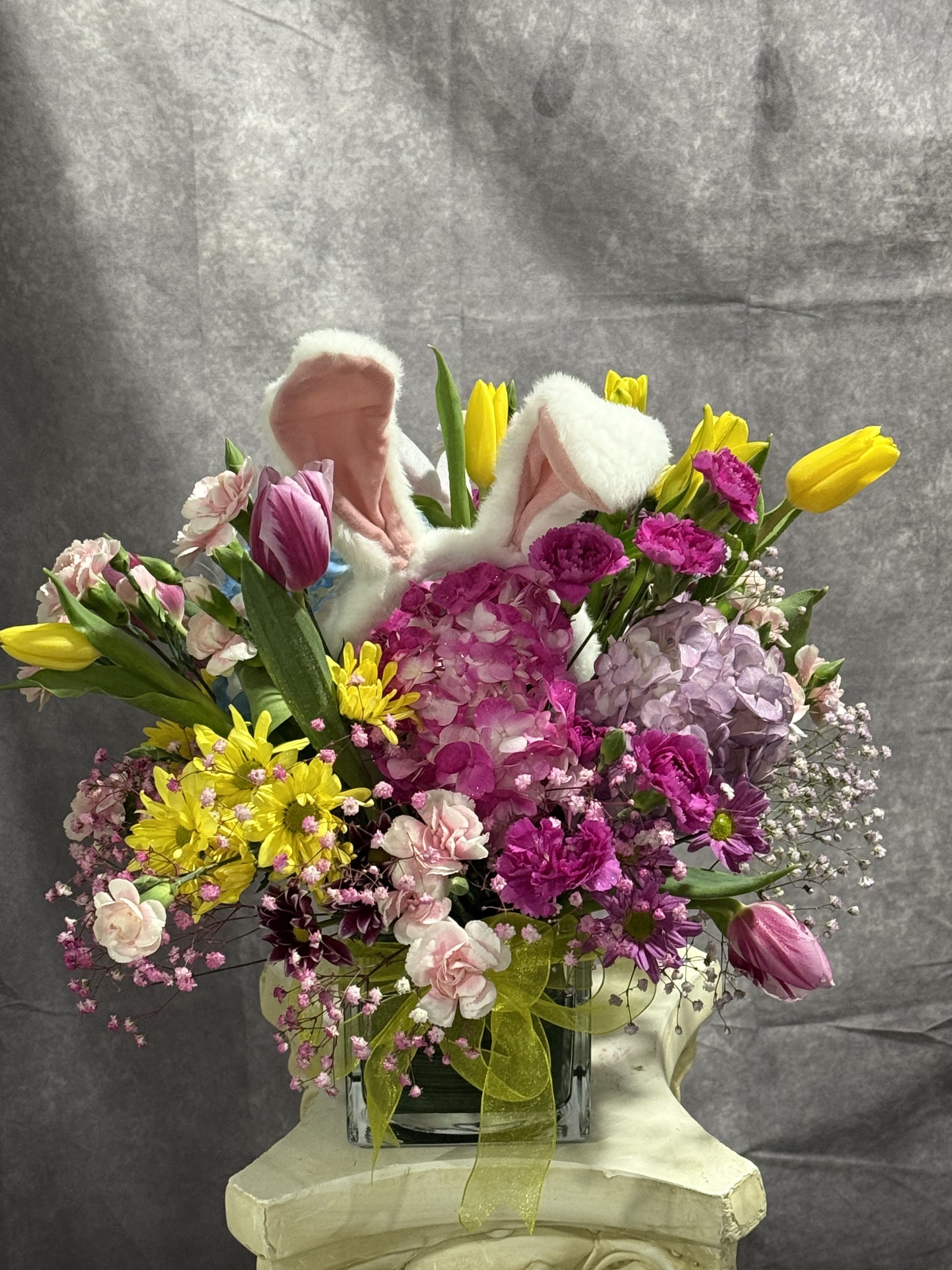 Hidden Bunny  - Variety of spring colors with hidden bunny ears and additional blooms to give special touch to bring joy for your love one as a Easter gift