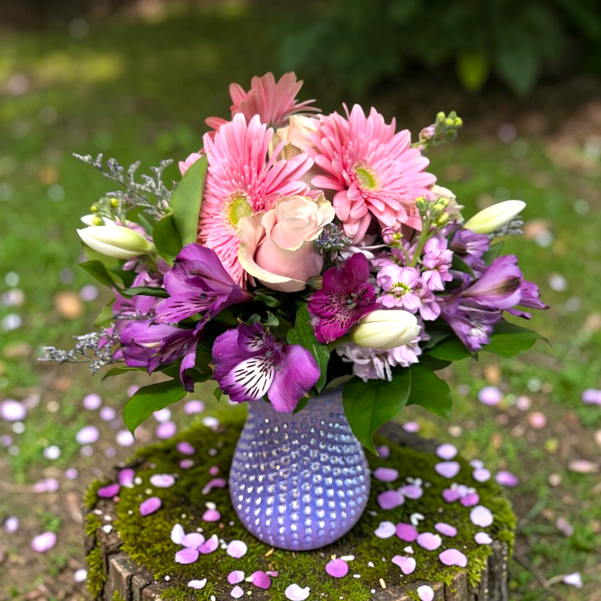 Spring Fever - You can't go wrong getting that special someone in your life this high-quality vase arrangement filled with colorful spring blooms.