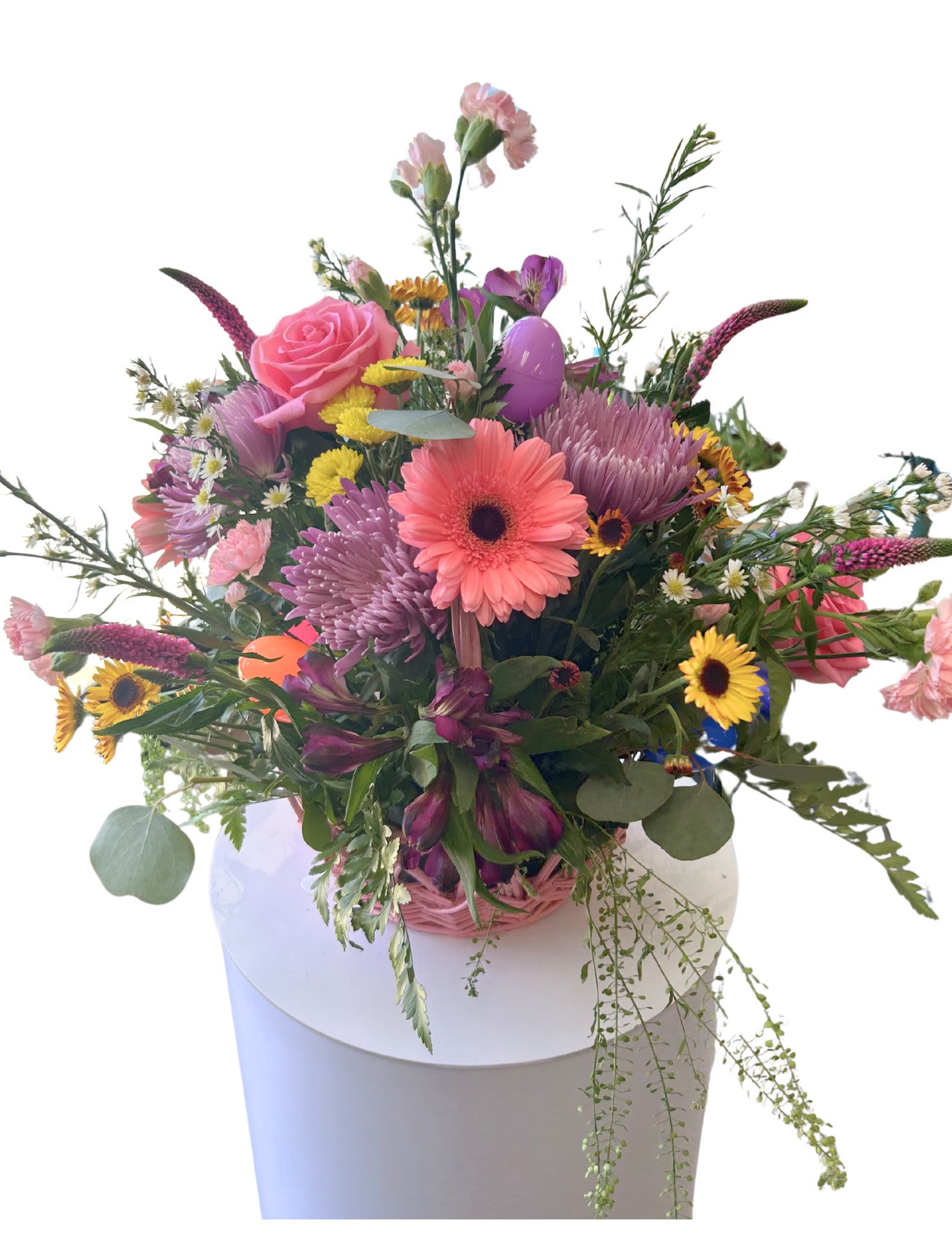 Joyous Easter  - The Easter Bunny himself couldn't deliver a more perfect springtime gift than this one!! With a wondrous and magnificent mix of Gerber Daisy's, Orange Daisy's, Buttons, Mums and Plastic Eggs you can bring spring's beauty indoors!