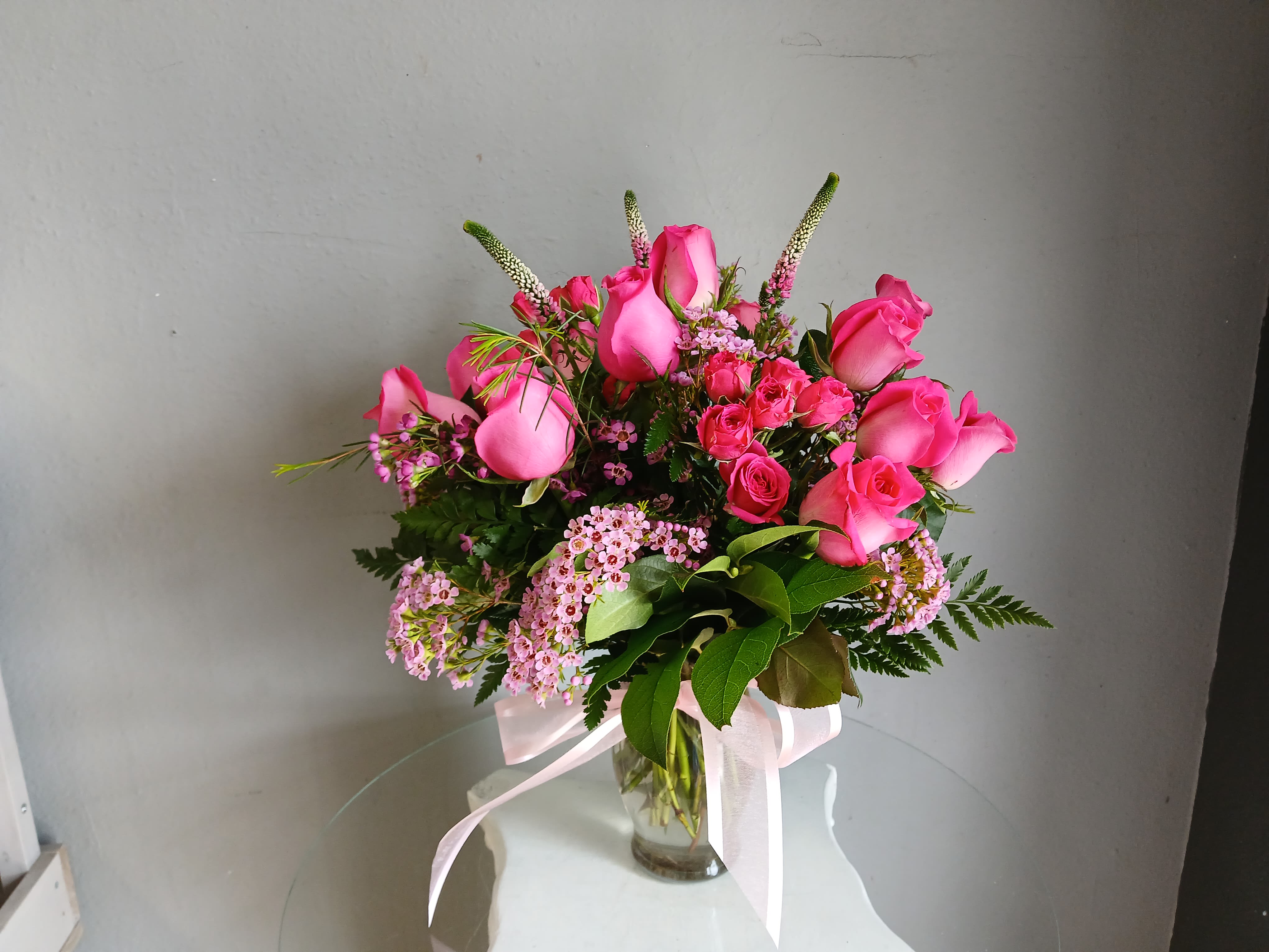 Designer's Choice Vase Arrangement  - This beautiful flower arrangement of fresh mixed seasonal blooms is made by local designers in the heart Orange California. Hand crafted and perfect for every occasion, from birthdays and new babies to sympathy and just because. The best choice to show you are thinking of that special someone. Can be sent as a local delivery or in-store pickup. This is an original, one of a kind arrangement. Order now before it's too late! 