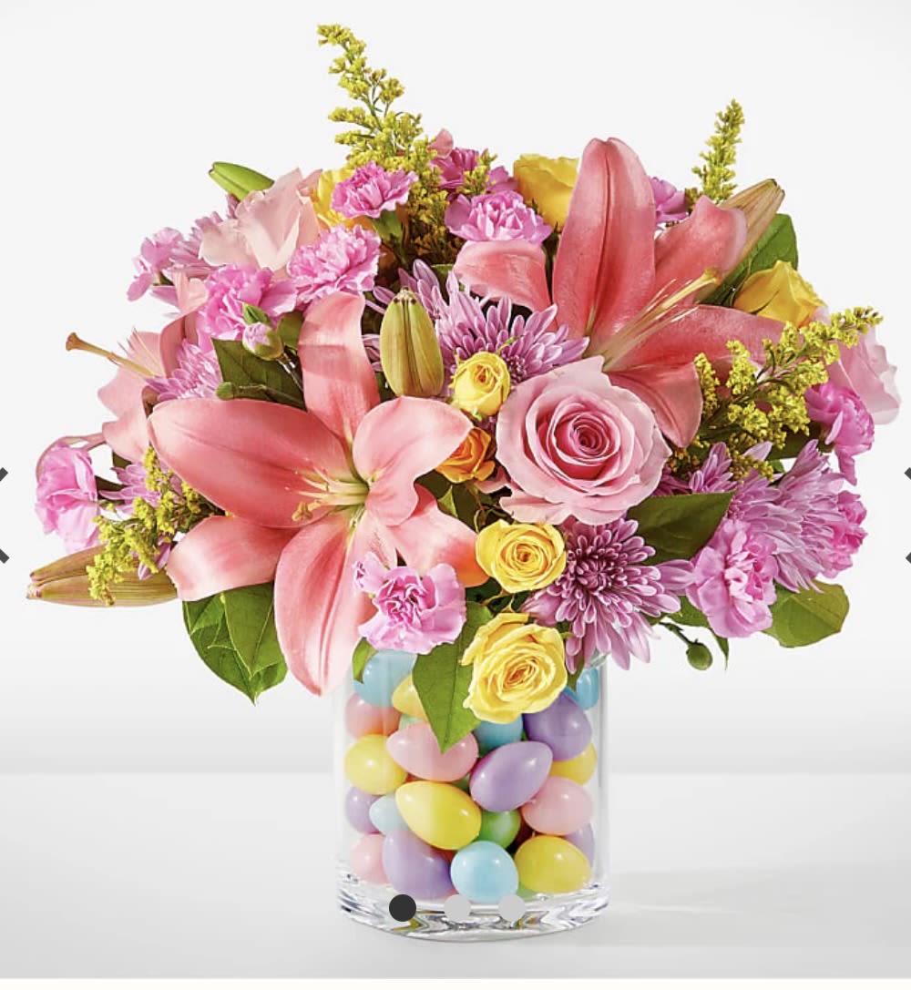 Easter Egg Hunt Bouquet - EASTER EGG HUNT BOUQUET  The hunt is over for the perfect Easter bouquet. This joyful explosion of pink, lavender and yellow is sure to light up their table this spring!