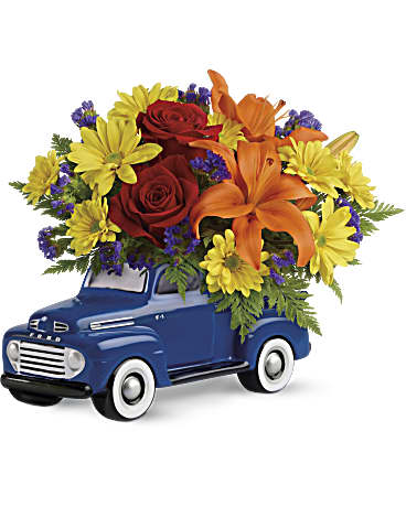 Vintage Ford Pickup Bouquet  - Dad's a true classic! So what better way to celebrate his special day than a classic '48 Ford Pickup, bursting with a colorful bouquet of roses, lilies and mums? In bold blue, this hand-painted ceramic collectible is a one-of-a-kind gift he'll always treasure. This little pickup includes red roses, orange asiatic lilies, yellow daisy spray chrysanthemums, purple sinuata statice, and leatherleaf fern. Delivered in an exclusive '48 Ford Pickup collectible keepsake.