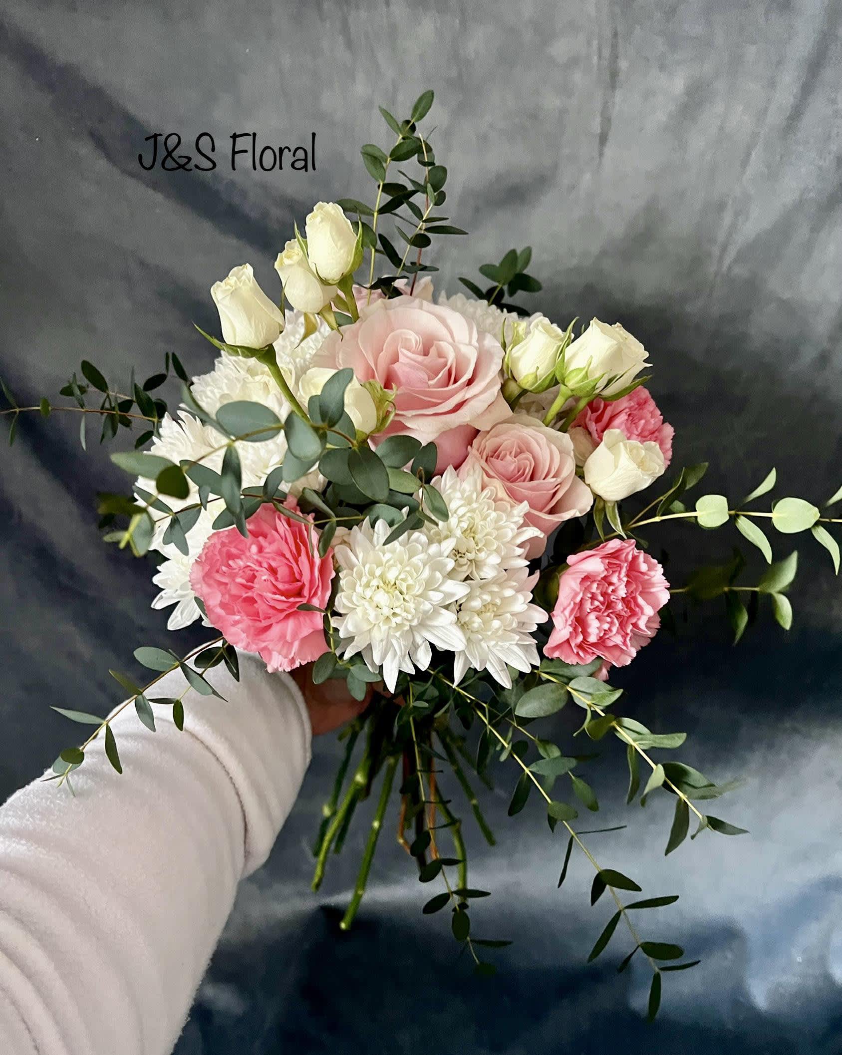 Pink Love Bouquet  - Introducing Our New Design Pink Love Bouquet, beautifully arranged with pink roses, white spray roses, carnation and cushion.  This is a hand tied bouquet and comes with no vase. 