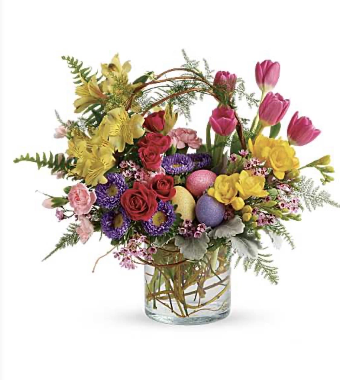 Happy Easter Pop of Spring - Pop goes spring! Celebrate the best of the season with this playful gift of roses, tulips, alstroemeria and asters accented with colorful Easter eggs.