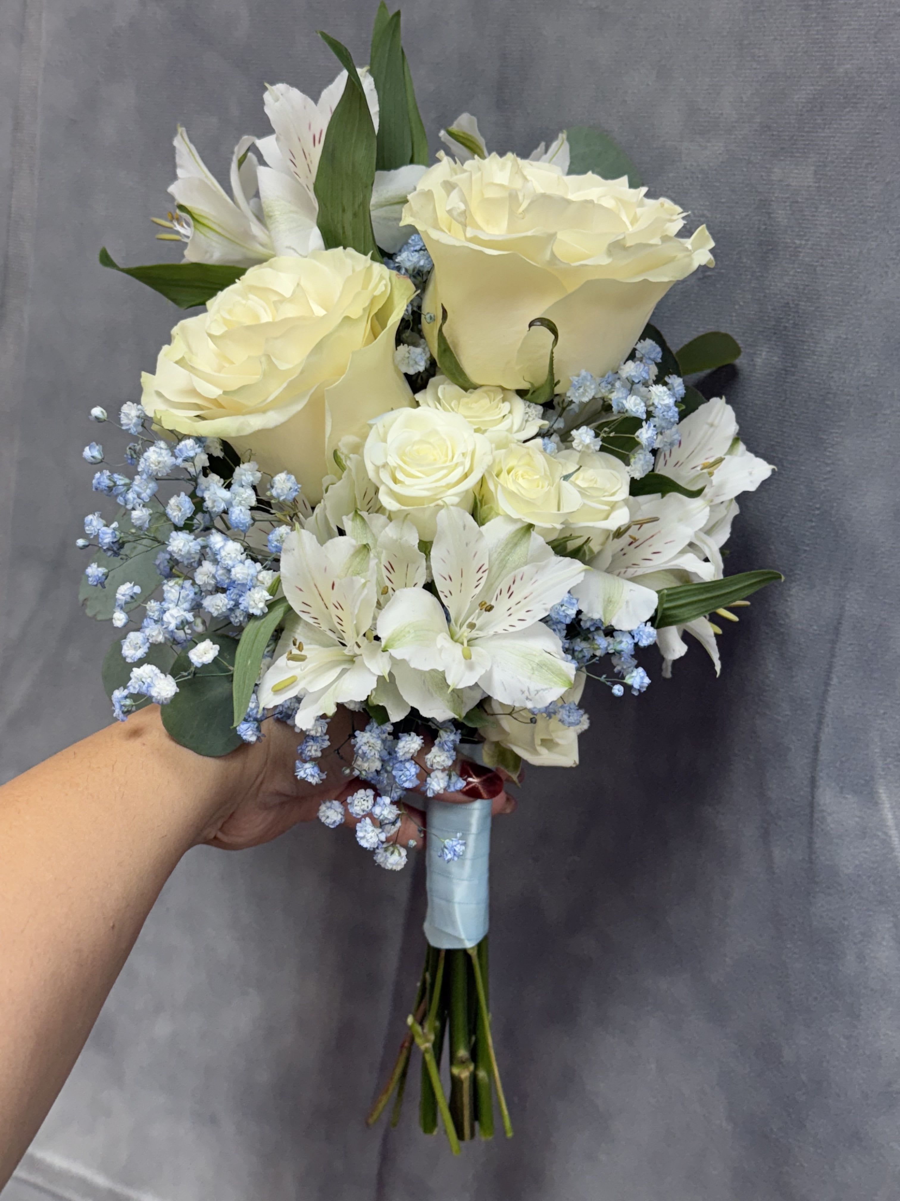 Blue whisper prom bouquet  - Blue Whisper prom bouquet with white rose , white alstroemeria light blue baby breath wrapped with light blue ribbon