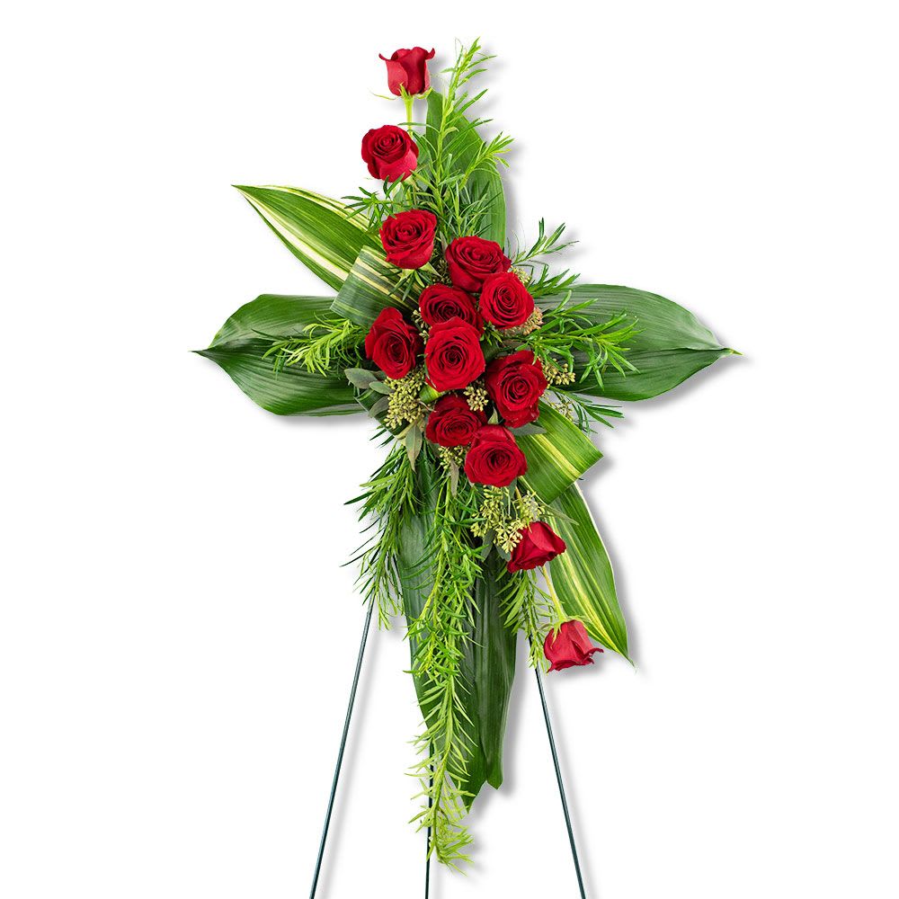Abiding Love Cross - Send your love with this gorgeous standing cross, including beautiful red roses and graceful greenery this piece is sure to honor lasting love and remembrance.