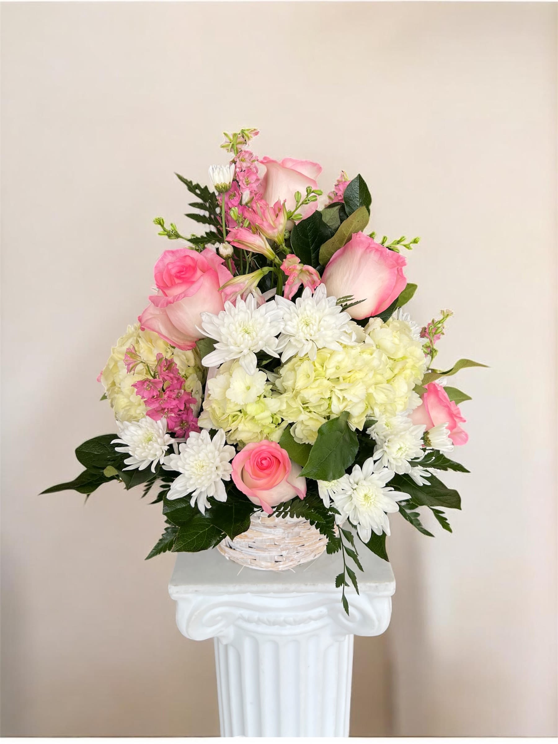 Blushing Tides Basket  - A delicate basket with soft pink roses, alstroemeria, and hydrangeas. Graceful and timeless to brighten anyone's day! 