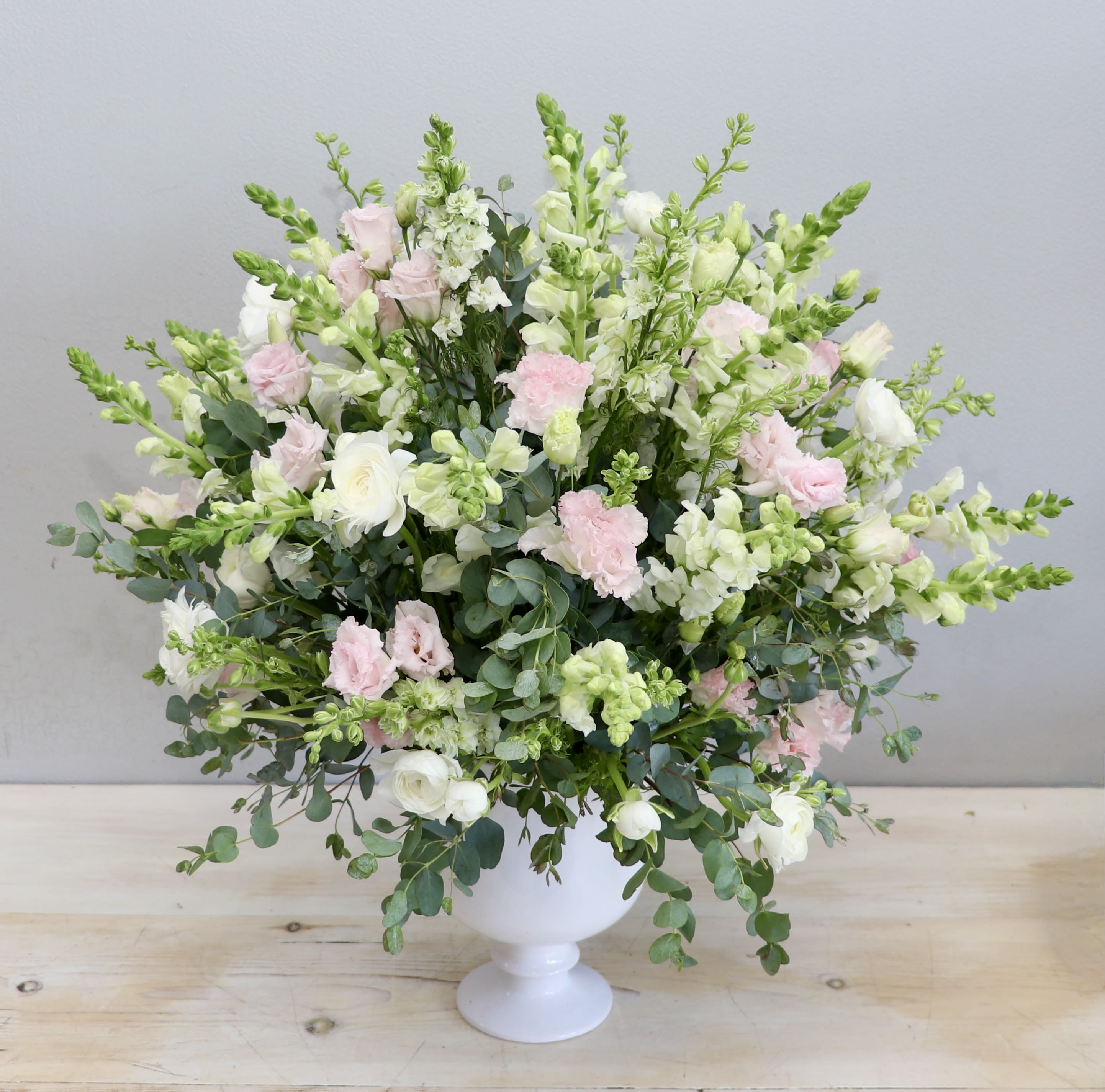Snapping Beauty - My Glendale Florist  - This beautiful arrangement show cases snap dragons mixed with pastel pink lisianthus for a sweet chic look. The photo shown is in the standard size, don't forget to upgrade for more blooms! 