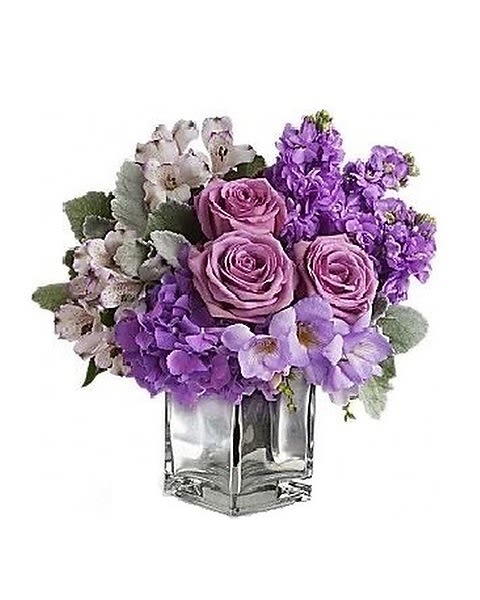 Sweet As Sugar - Visions of sugar plum fairies dance to life with this magical bouquet. Lush lavenders, frosty whites and silvery greens look romantic and refreshing inside a cool cube vase. Mirrored cubes are currently unavailable and will be replaced with a clear glass cube 