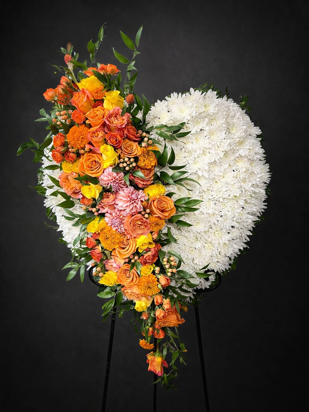 Heart of the Family - A beautiful heart filled with white flowers and a coral swag. 