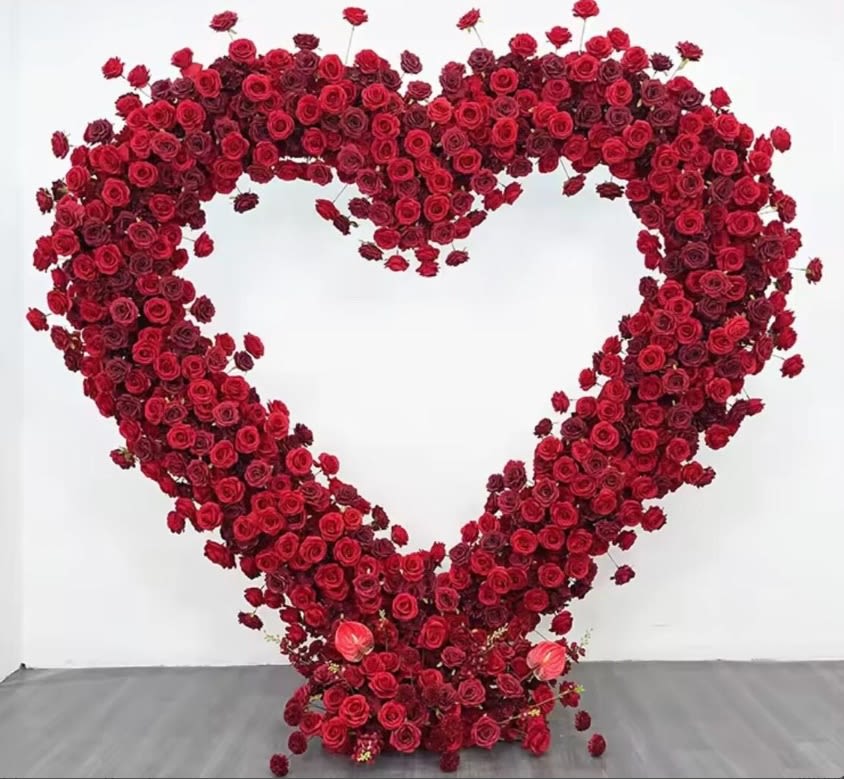 PROPOSAL Heart Arch - Ultimate “She Said Yes” Package  Create an unforgettable moment with our most luxurious and breathtaking proposal experience. This all-inclusive setup is designed to transform any space into a romantic, picture-perfect setting—crafted to leave a lasting impression and make your proposal truly extraordinary.  Includes:  Oversized luxury heart rose installation Personalized design tailored to your colors and theme Optional upgrades (marquee letters, balloons, and more) Professional setup and breakdown service  Perfect for: Luxury, high-impact proposals that deserve nothing less than perfection  Please Note: We recommend calling the shop to customize your proposal. Restrictions may apply—please call for full details.   Limited availability—reserve your date today and let us create the perfect “yes” moment.