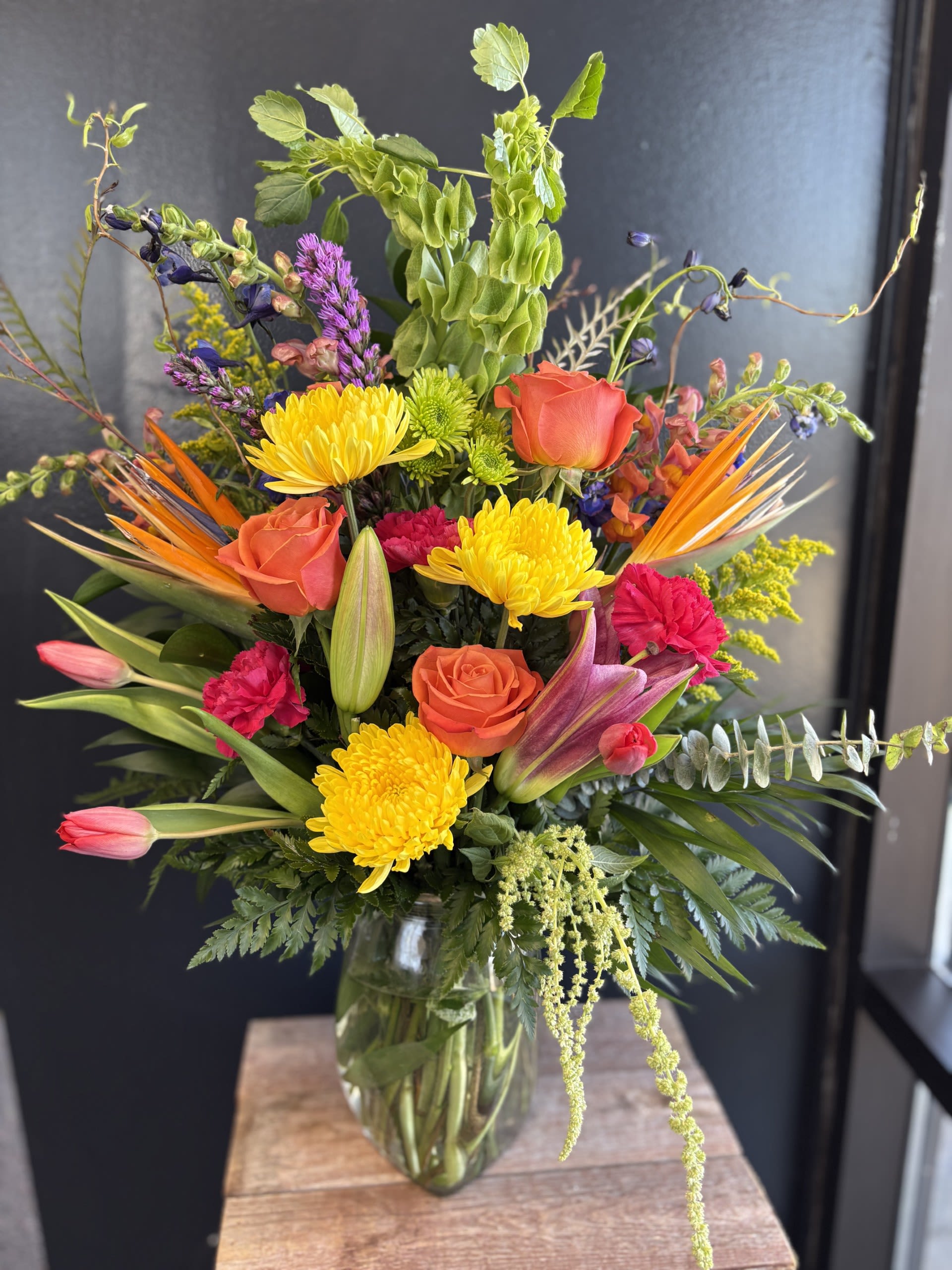 Tropical Paradise  - Enjoy a fresh mix of tropical flowers. 