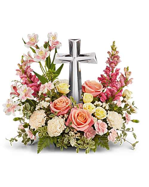 Grace and Glory Bouquet  - Celebrate faith and renewal with a Grace &amp; Glory Bouquet, featuring soft coral roses, pink alstroemeria, and delicate blooms surrounding a radiant crystal cross-an inspiring symbol of peace and everlasting love.  Grace &amp; Glory Bouquet includes coral roses, yellow spray roses, pink alstroemeria, crème carnations, pink miniature carnations, hot pink snapdragons, and white statice, accented with pitta negra and leatherleaf fern. Presented with a large crystal cross keepsake.
