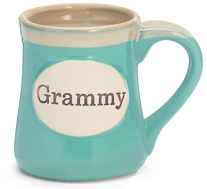 Turquoise ceramic mug with a cream oval label reading “Grammy” on the front