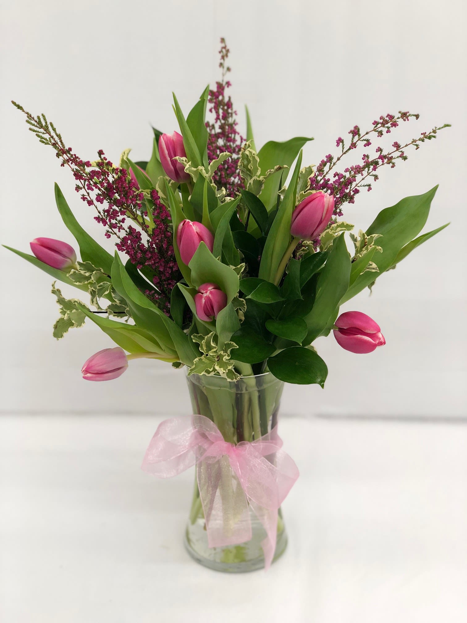 Pink Tulips - Local Delivery Only  - LOCAL DELIVERY ONLY; Local delivery is limited to Austell, Mableton, Marietta, Smyrna and Vinings.  Fresh tulips, beautifully and artfully arranged by one of our talented designers. Filler flowers and greenery may vary.  10 STEMS AS SHOWN  