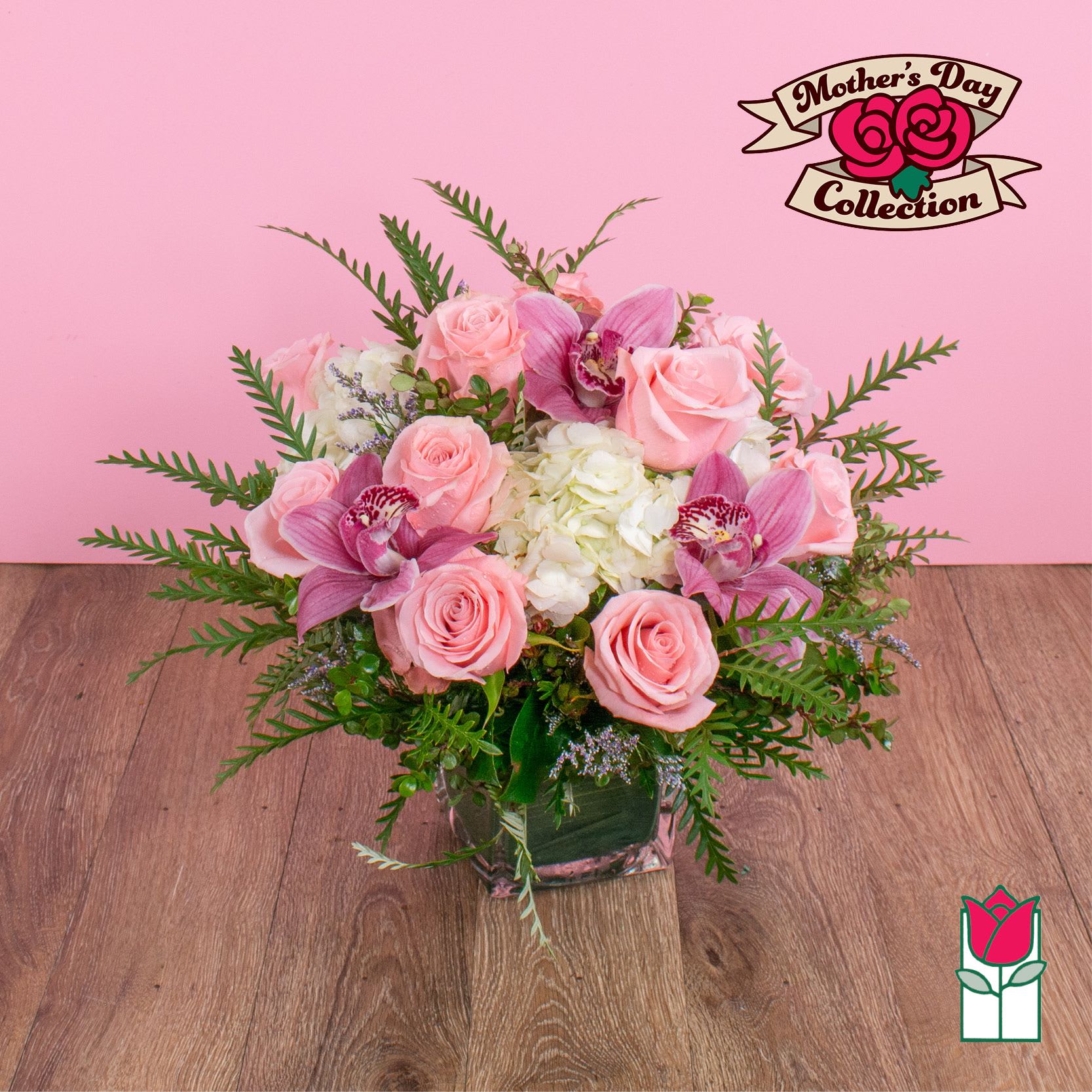 Beretania's Olivia Bouquet (Bubblegum Rose &amp; Pink Cymbidium) [Hue Varies] - Elevate your space with the Beretania Florist Compact Bouquet, a charming floral arrangement that effortlessly combines elegance and versatility. Housed in a beautiful 4" glass cube vase, this compact bouquet features a delightful composition of hydrangeas, foliage, and your choice of roses in various colors, allowing you to tailor it to your preferences.  Whether you opt for the timeless allure of red roses, the soft romance of pink, or the vibrant cheerfulness of yellow, each variant of the compact bouquet brings a unique charm to any setting. The meticulous design ensures a harmonious blend of textures and hues, creating a visually appealing arrangement that suits any occasion.  For those seeking an extra touch of sophistication, consider our upgraded option – the Olivia Compact Bouquet. This variant remains true to the original design but introduces the exotic beauty of colorful cymbidium orchid blossoms, elevating the bouquet to a new level of elegance.