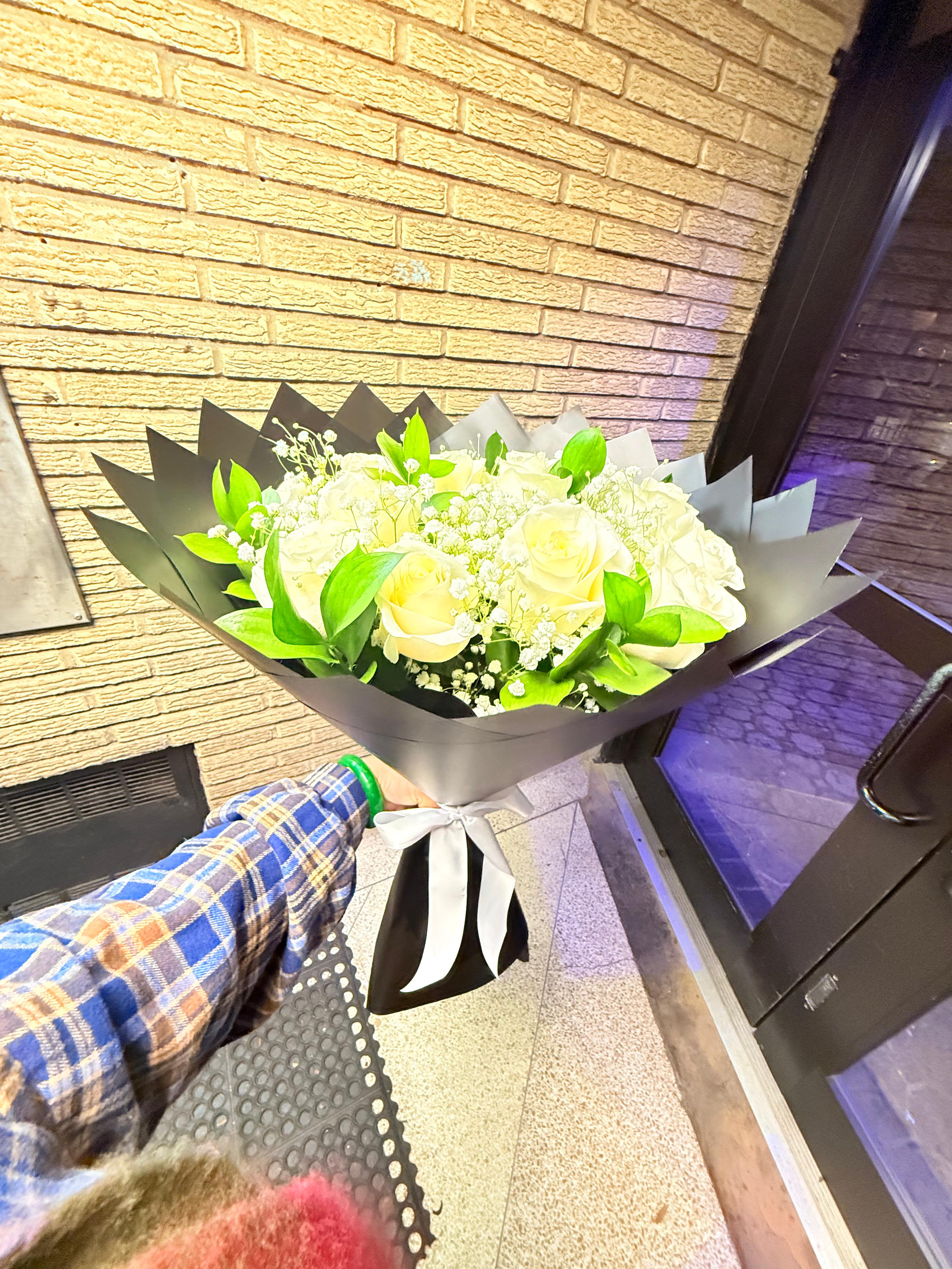 Pure Love Dozen White Rose Bouquet - Beautiful bouquet of white roses in black wrapping paper or paper of your choice.  It's pure love in a bouquet!