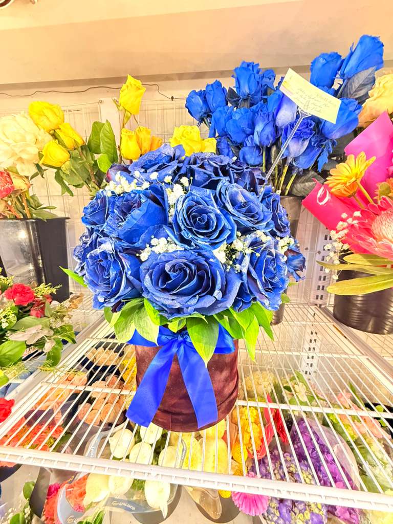 Blueberry Deluxe Box Arrangement  - Beautiful Vase of Bloomed blue roses great for that special male person in your life or to whoever is a huge of fan of the color blue!!!