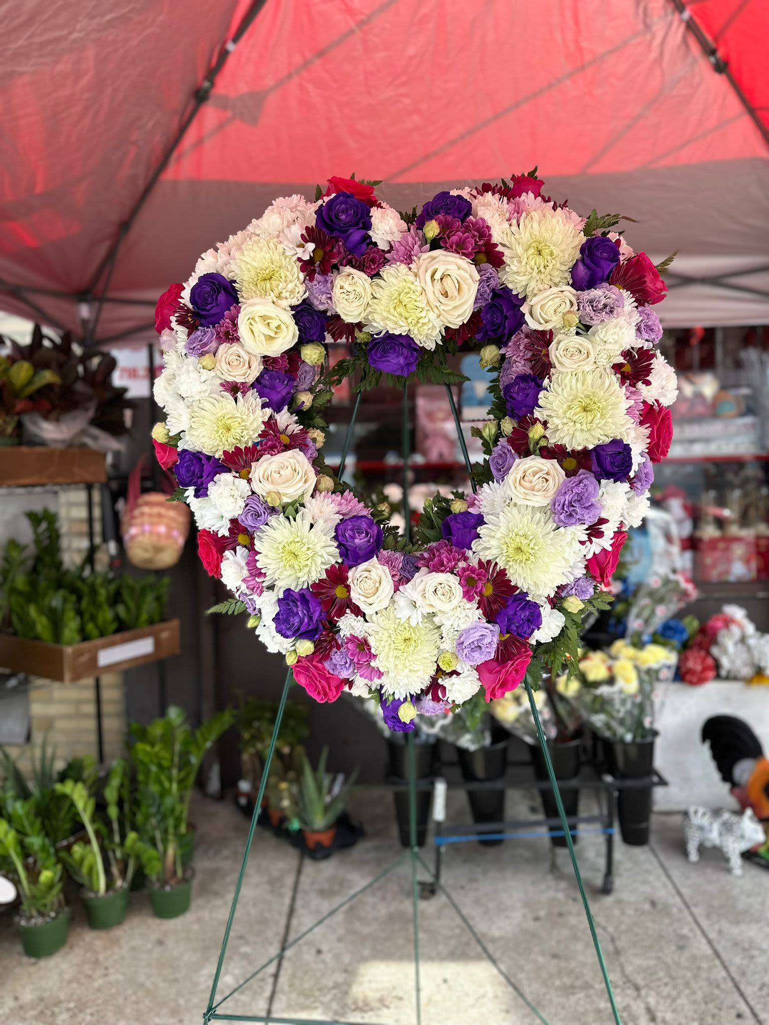 Purple Lovers Heart Arrangement - For any loved one with a favoritism for purple. This beautiful arrangement is great for anyone who is in love with the color purple.