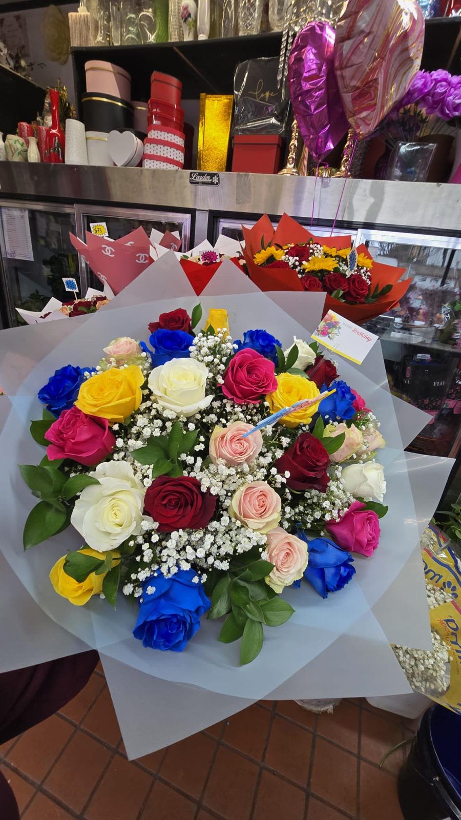 Jumbo Rose Mix Bouquet - Colorful bouquet filled with almost every color possible to make this bouquet look as unique and special as possible.